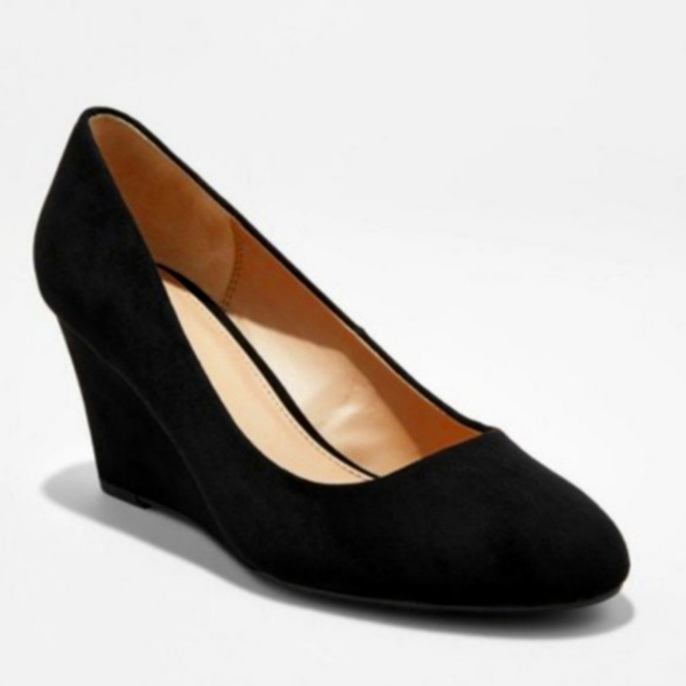 Black suede closed heel pumps